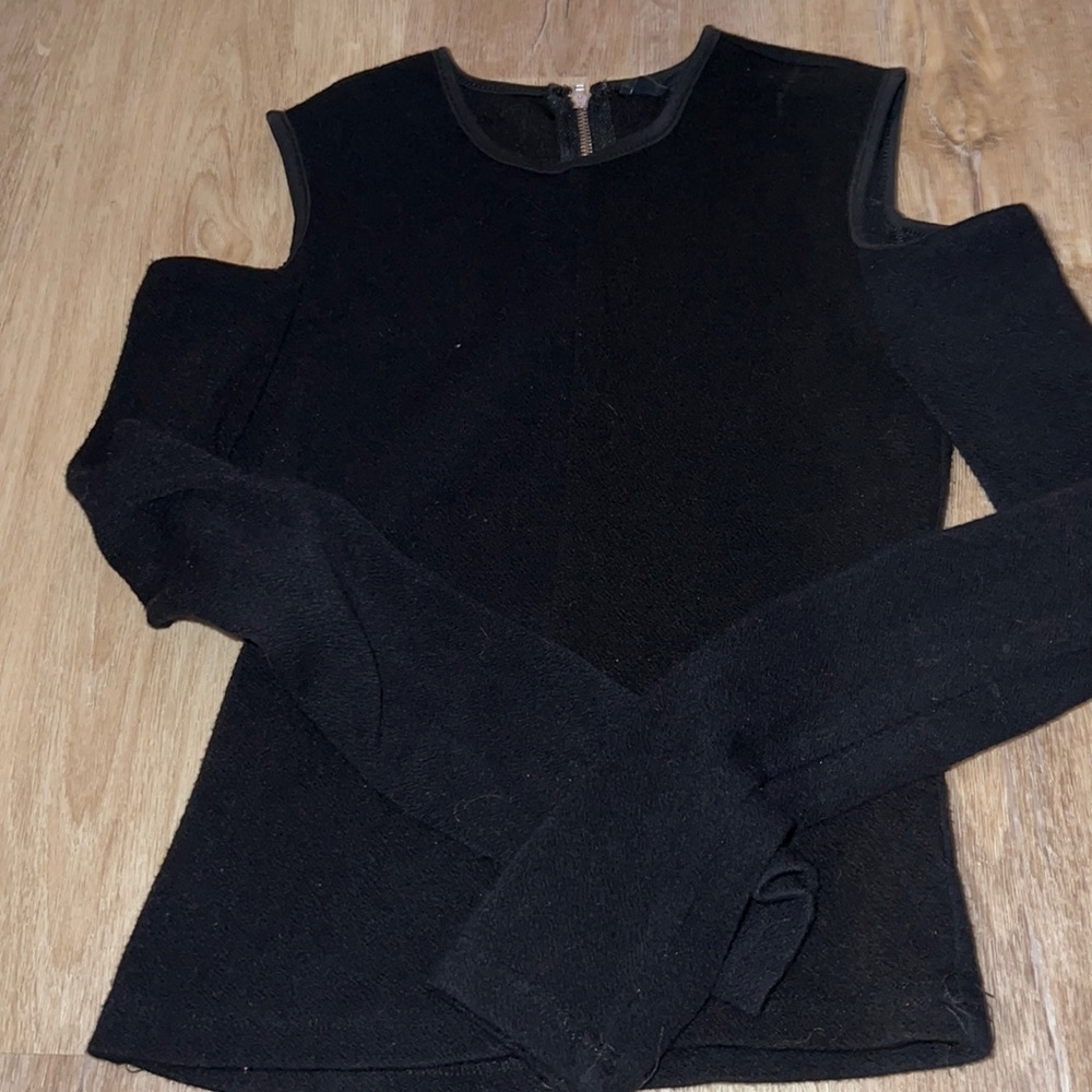 Boutique too with holes cutouts on shoulders